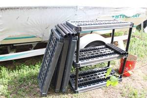 lot 310 image: Plano Plastic Shelving Unit 3-tier (incomplete) - (6) Shelves, (15) Pipe Stands