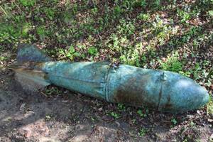 lot 329 image: Vintage 63 Hollow Metal Torpedo