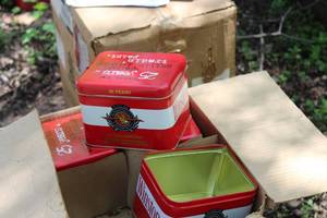 lot 226 image: Lot of (24) NASCAR Winston Cup 25th Anniversary Tin Containers