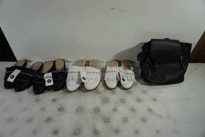 Sandals and Black Backpack