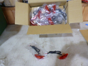 lot 99 image: Case of Peterson Manufacturing Red Marker Lights