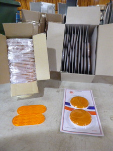 lot 109 image: 2 Cases of Amber Reflectors