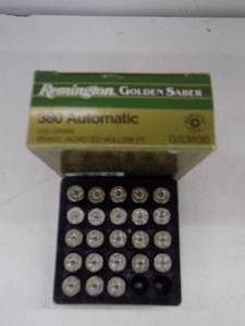 lot 74 image: 23 Remington Golden Saber 380 Auto