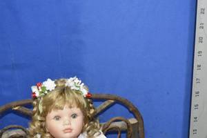Sitting doll with bench