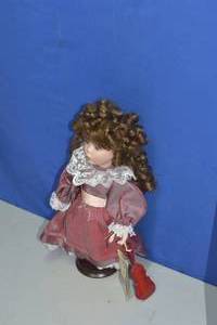 Doll with Violin by Seymore Mann