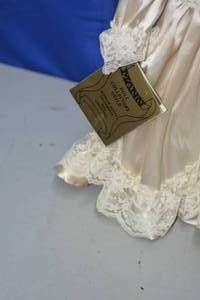 Doll in white by Seymore Mann