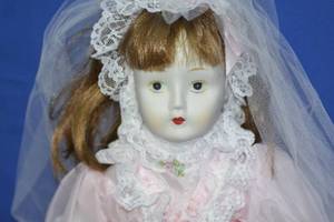 Pale Doll in pink dress