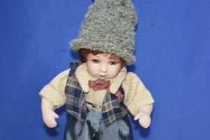 Doll on stand