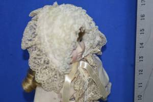 Doll on stand
