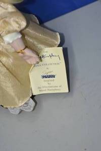 Doll in Gold by Seymour Mann