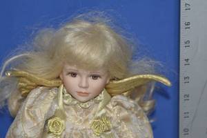 Gold Angel by Seymour Mann