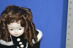 Doll in black