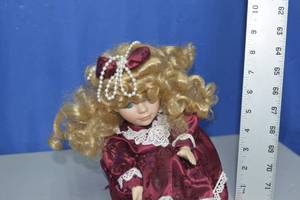 Doll with music box - works when wound out