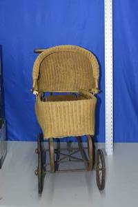 Antique wicker baby buggy