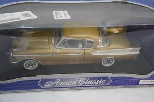 lot 9 image: collector die cast car 1957 Studebaker Golden Hawk