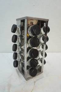 lot 26 image: spice rack with spice jars
