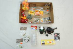 lot 40 image: fishing lures, bobbers, and reels