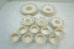 lot 131 image: set of Warwick China-warranted 22k gold