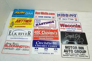 lot 151 image: auto dealership advertisement license plates