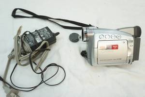 lot 152 image: Cannon digital video camera with charger
