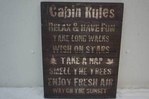 lot 222 image: cabin rules sign