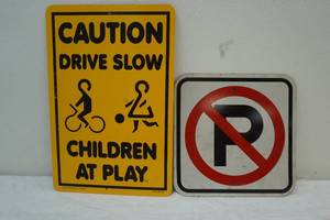 lot 228 image: caution sign and no parking sign