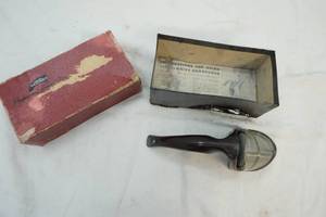 lot 54 image: vintage Cutco hand knife sharpener
