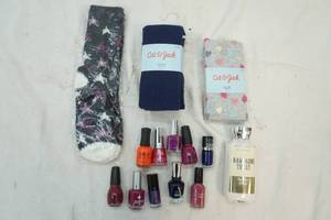 lot 94 image: girls tights, nail polishes and socks