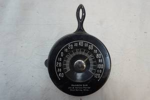 lot 108 image: vintage Rainbow Bar metal frying pan themed wall thermometer