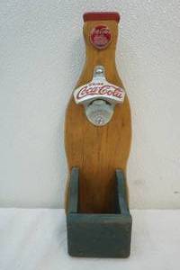 lot 110 image: Coca-Cola wood bottle opener