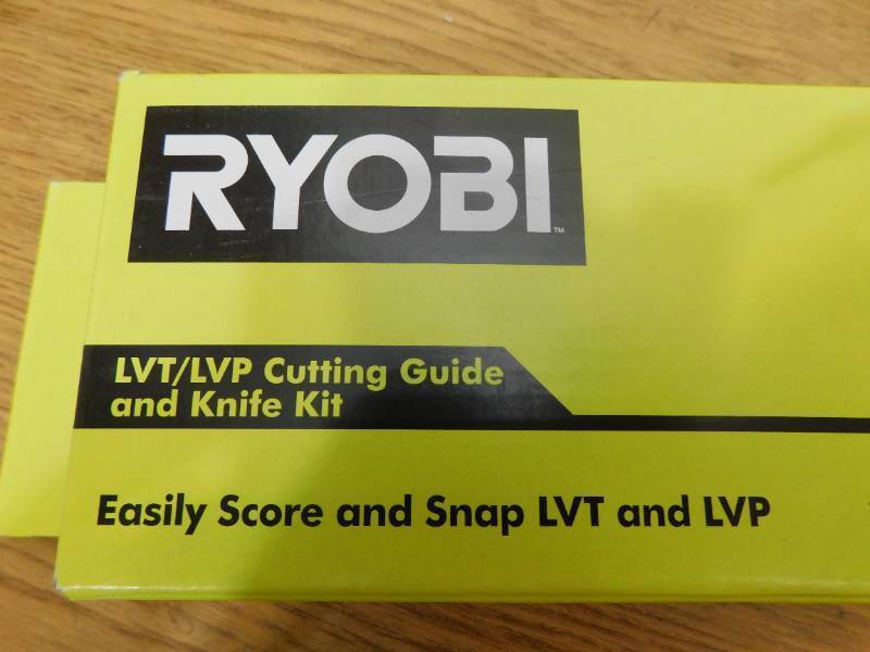 lot 21 image: RYOBI LVTLVP Cutting Guide and Knife Kit