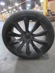 lot 713 image: SET OF 4 PIRELLI SCORPION ZERO 28535ZR 22 106W With Black Tesla Rims.- USED.