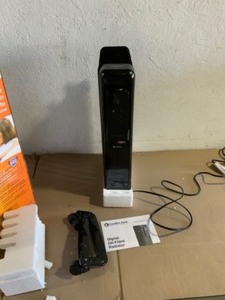 lot 40 image: Comfort Zone 1500-Watt Electric Oil Filled Space Heater with Digital Display. See Pictures