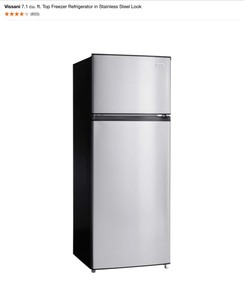 lot 52 image: Vissani 7.1 cu. ft. Top Freezer Refrigerator in Stainless Steel Look. See Pictures