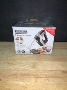 lot 70 image: Hamilton Beach Professional 5-Speed Black Hand Mixer with Stainless Steel Attachments and Snap-On Storage Case. See Pictures