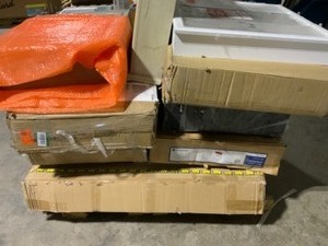 lot 107 image: Pallet with Medicine Cabinets, Bathroom Fixtures, Vanity & More Various Conditions. See Pictures