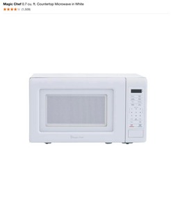 lot 108 image: Magic Chef 0.7 cu. ft. Countertop Microwave in White. See Pictures