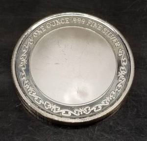1 TROY OZ .999 FINE SILVER OFFICIAL SLUG ROUND