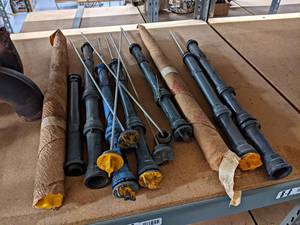 Lot of Exhaust Manifolds and Engine Oil Dipsticks - Located on Mezzanine