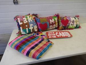 Pillows, and Sign with Colorful Rug