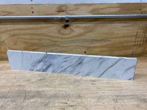 lot 112 image: HAMPTON BAY Laminate Endsplash for Countertop with Integrated Backsplash in Calcutta MarbleTextured Gloss