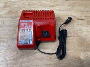 lot 72 image: MILWAUKEE 48-59-1812 M12 or M18 18V and 12V Multi Voltage Lithium Ion Battery Charger w Onboard Fuel Gauge