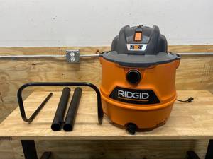 lot 79 image: RIDGID 16 Gallon 6.5-Peak HP NXT WetDry Shop Vacuum with Cart, Fine Dust Filter, Hose and Accessories