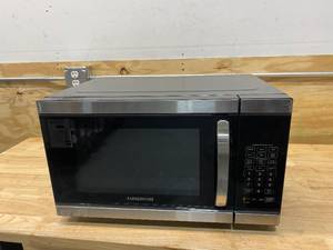 lot 117 image: FARBERWARE Gourmet 1.1 Cu. Ft. Countertop Microwave in Stainless Steel with Smart Sensor and Inverter Technology