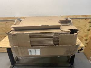 lot 137 image: HOME DEPOT Lot of 40- 21 in. L x 15 in. W x 16 in. D Medium Moving Boxes with Handles