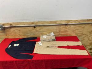 lot 155 image: DOCKERS Lot of 3 Pairs of- Girls Jeggings (10 Regular) in Khaki with Navy Sweater (810 Regular)