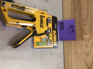lot 69 image: DEWALT 5 in 1 Multi-Tacker Stapler and Brad Nailer Multi-Tool
