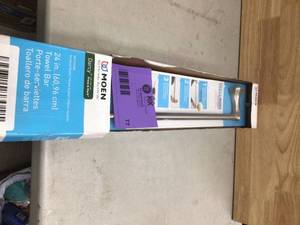 lot 77 image: MOEN Darcy 24 in. Towel Bar with Press and Mark in Brushed Nickel Open box