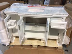 lot 101 image: Sassy 60 in. Vanity in White with Marble Vanity Top in Carrara White by Home Decorators Collection Customer Returns See Pictures