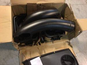 lot 112 image: 30 in. Bagger for RYOBI 30 in. Riding Mowers by RYOBI Customer Returns See Pictures